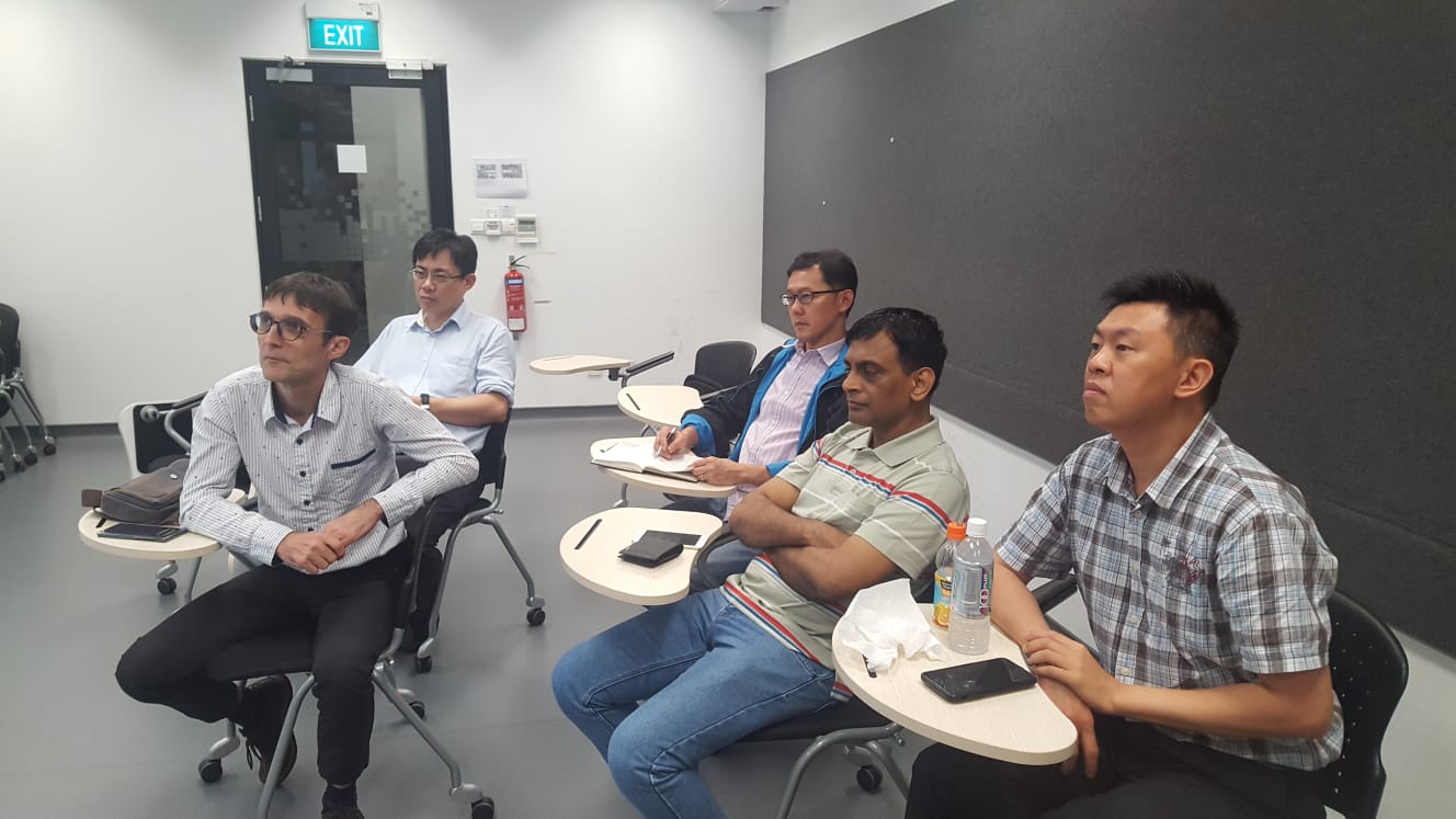 The audience listening to the talk